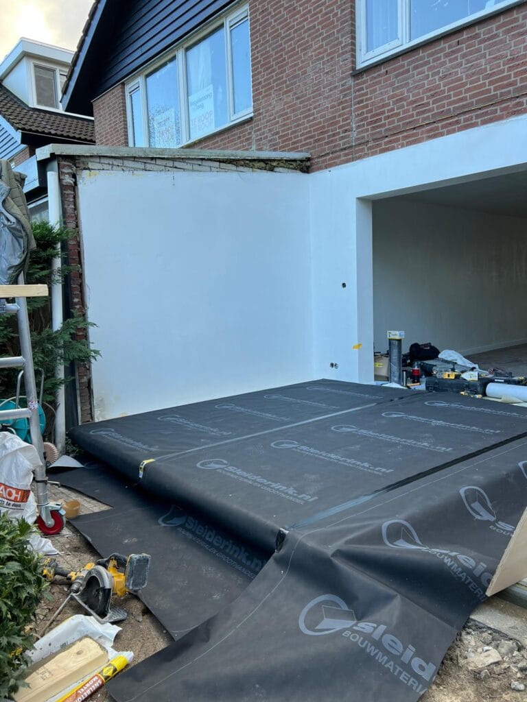 Aanbouw Rotterdam wanden hsb plaatsen met folie